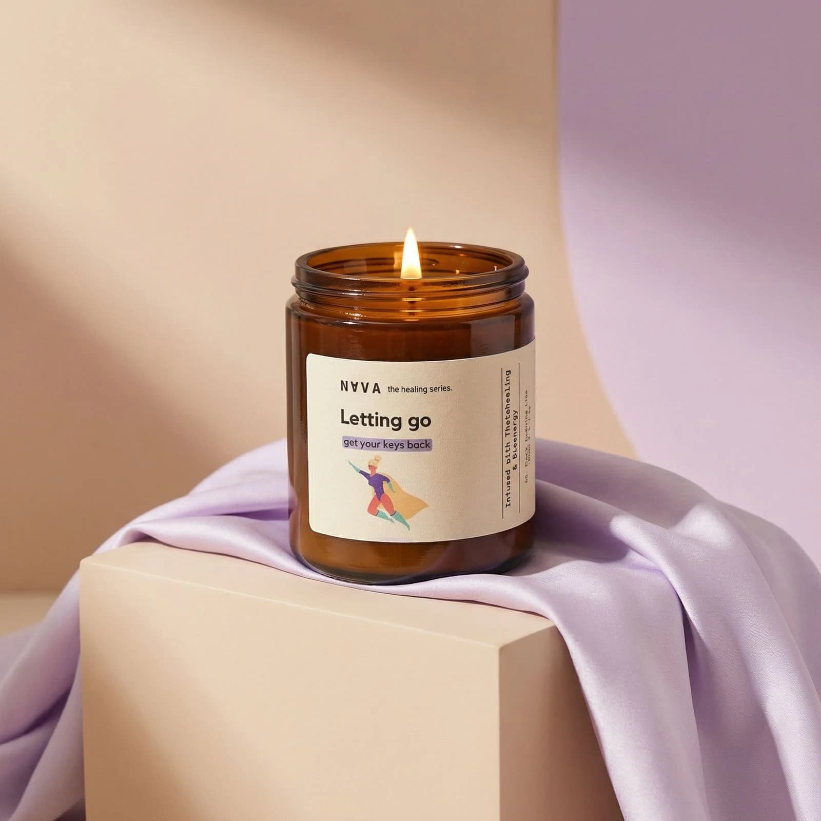 NAVA Letting Go candle on lilac textile
