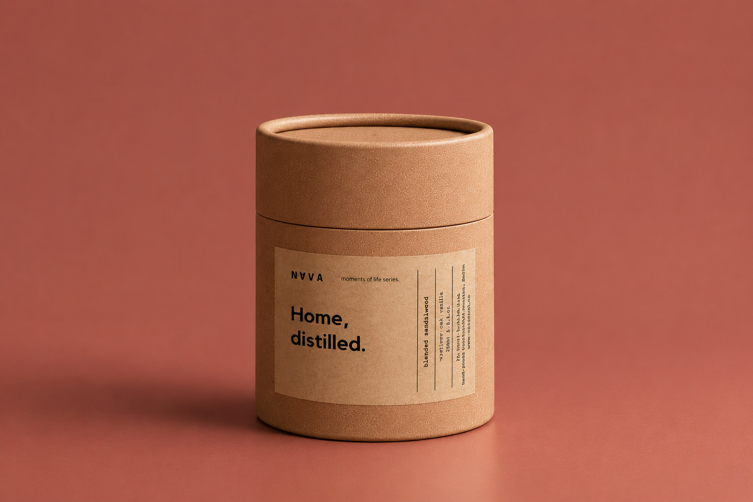 NAVA Home Distilled candle on a terracotta surface, blended sandalwood scent