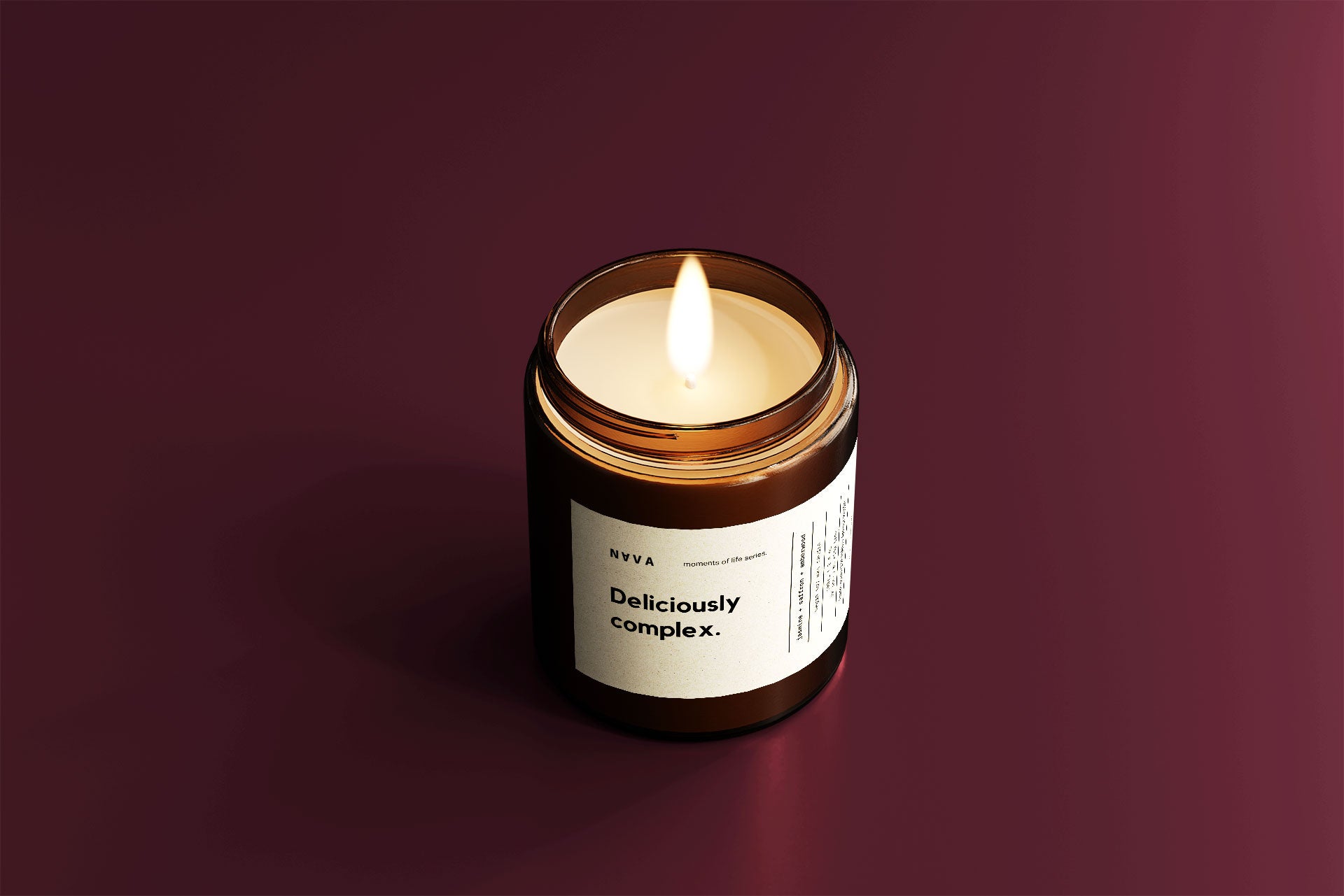 Deliciously Complex amber glass soy candle by NAVA — jasmine, saffron and amberwood scent