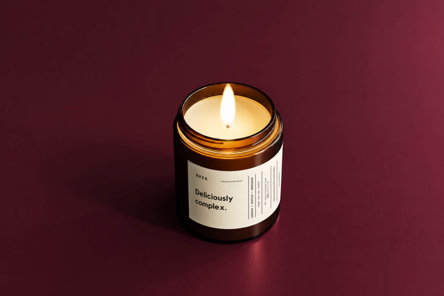 Deliciously Complex amber glass soy candle by NAVA — jasmine, saffron and amberwood scent